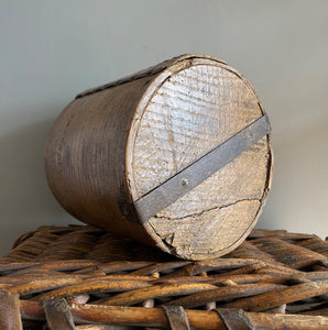 A Victorian Grain Measure. Constructed from yew wood with metal strapping. Marked with the Victorian Crown and the words 'Co LEICESTER' on the reverse