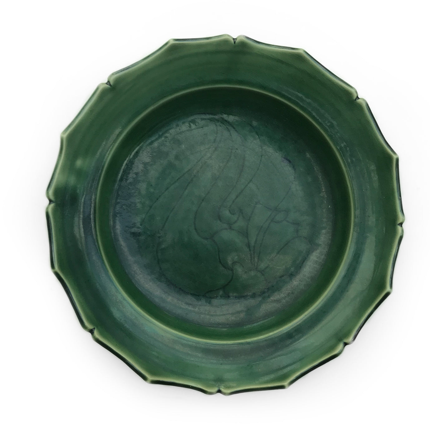 Beautiful pair of green glazed pottery plates with subtle painted decoration to them - SHOP NOW - www.intovintage.co.uk