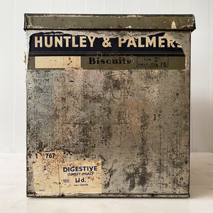 An Edwardian Huntley & Palmer’s large square Biscuit tin that would have been used in a shop to store biscuits for sale. Fantastic typography to the front with well preserved colourful print - SHOP NOW - www.intovintage.co.uk