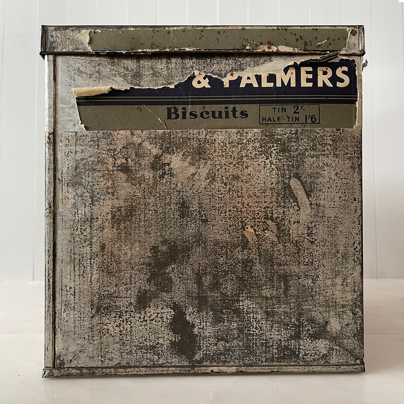 An Edwardian Huntley & Palmer’s large square Biscuit tin that would have been used in a shop to store biscuits for sale. Fantastic typography to the front with well preserved colourful print - SHOP NOW - www.intovintage.co.uk