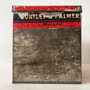 An Edwardian Huntley & Palmer’s large square Biscuit tin that would have been used in a shop to store biscuits for sale. Fantastic typography to the front with well preserved colourful print - SHOP NOW - www.intovintage.co.uk