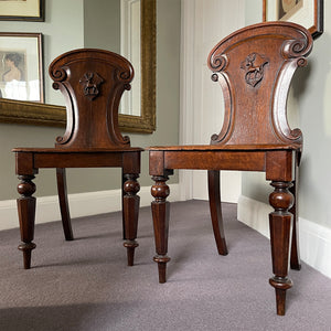 A fine Pair of Victorian Oak Hall Chairs