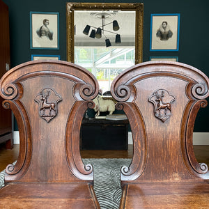 A fine Pair of Victorian Oak Hall Chairs