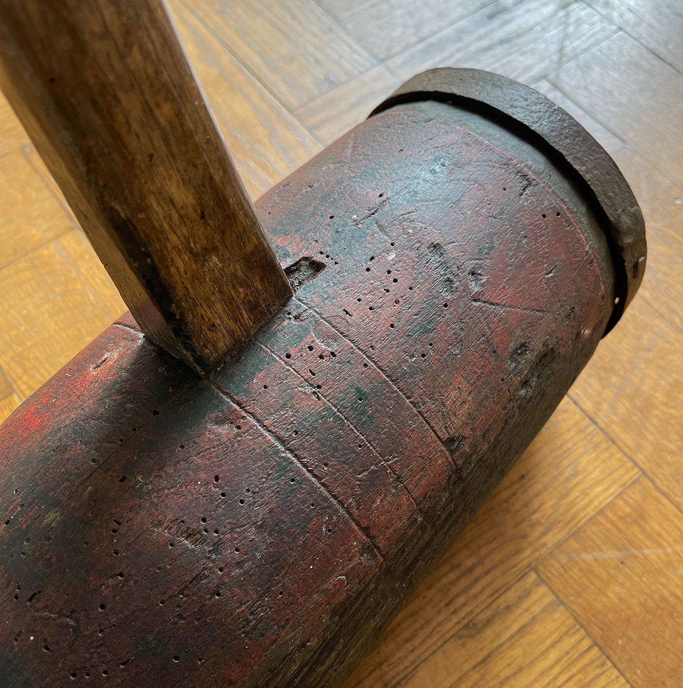 A Large Antique Circus/Fairground Hammer with remnants of its original red paint. It has two metal riveted straps at each end with a sturdy hickory handle - SHOP NOW - www.itovintage.co.uk