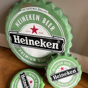 A whopping great big metal Heineken Bottle Cap ready to hang on your wall. Constructed from pressed steel with screen printed graphics to the surface - SHOP NOW - www.intovintage.co.uk