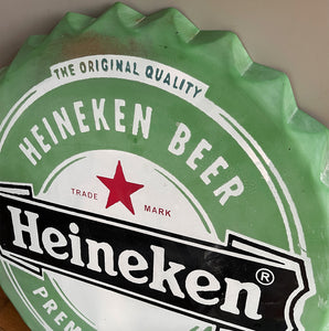 A whopping great big metal Heineken Bottle Cap ready to hang on your wall. Constructed from pressed steel with screen printed graphics to the surface - SHOP NOW - www.intovintage.co.uk