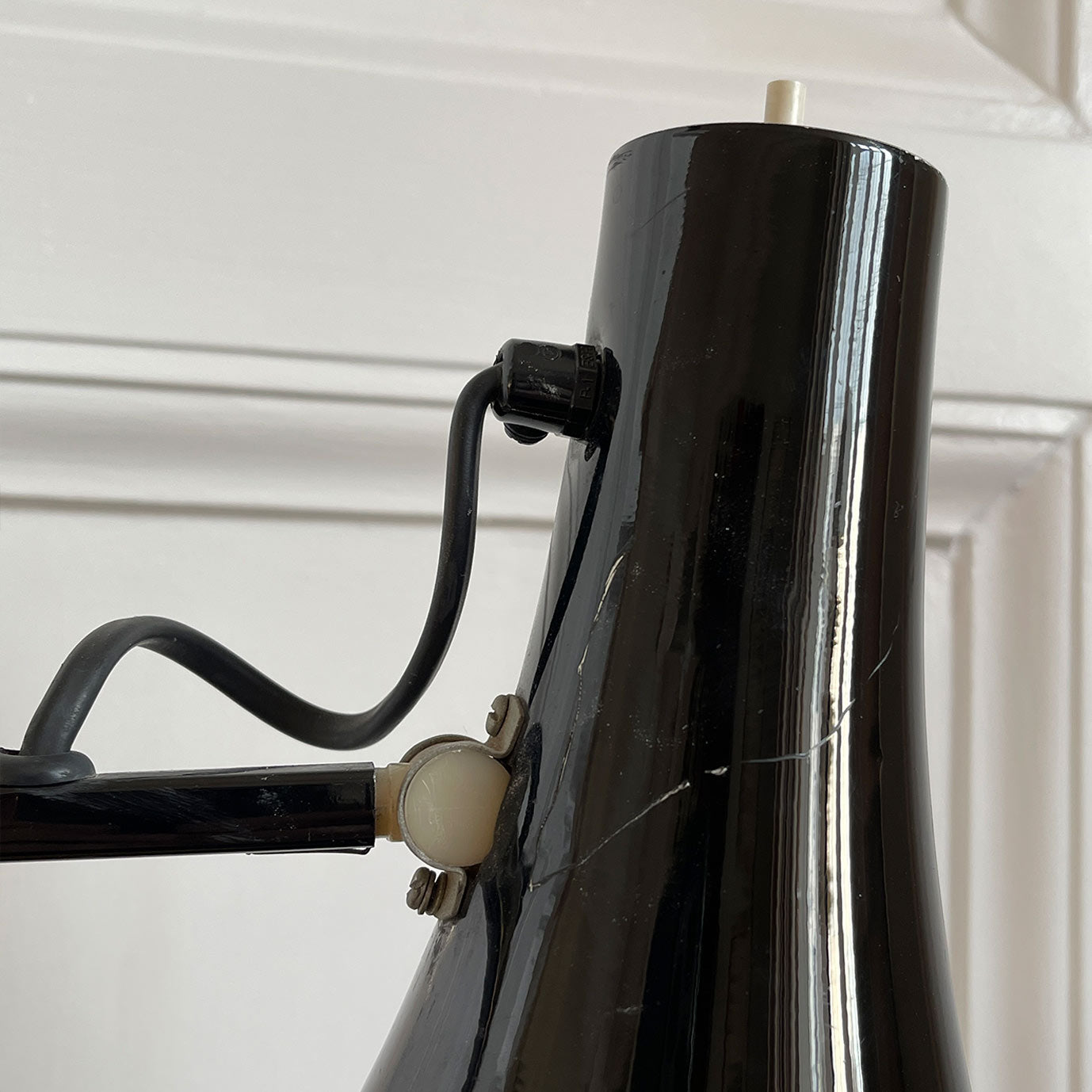 An early 1970s Herbert Terry Model 90 Adjustable Desk Lamp in black. The fluted shade has a push button switch to the top, the side arms are constructed from steel with nylon linkages. The small footprint base has a steel cover. Marked Herbert Terry to the lower arm. A smart looking lamp for the home or office. - SHOP NOW - www.intovintage.co.uk