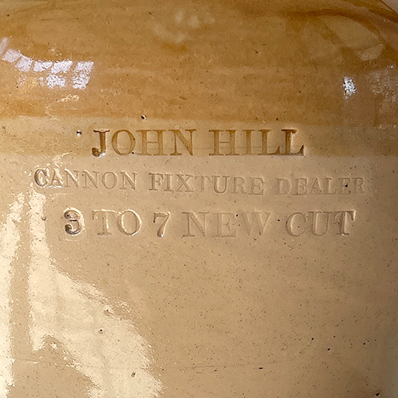 An Antique John Hill Earthenware Tobacco Jar with its original tin lid. Stamped 'JOHN HILL, CANNON FIXTURE DEALER, 3 to 7 NEW CUT' with remnants of its original tobacco label - SHOP NOW - www.itovintage.co.uk