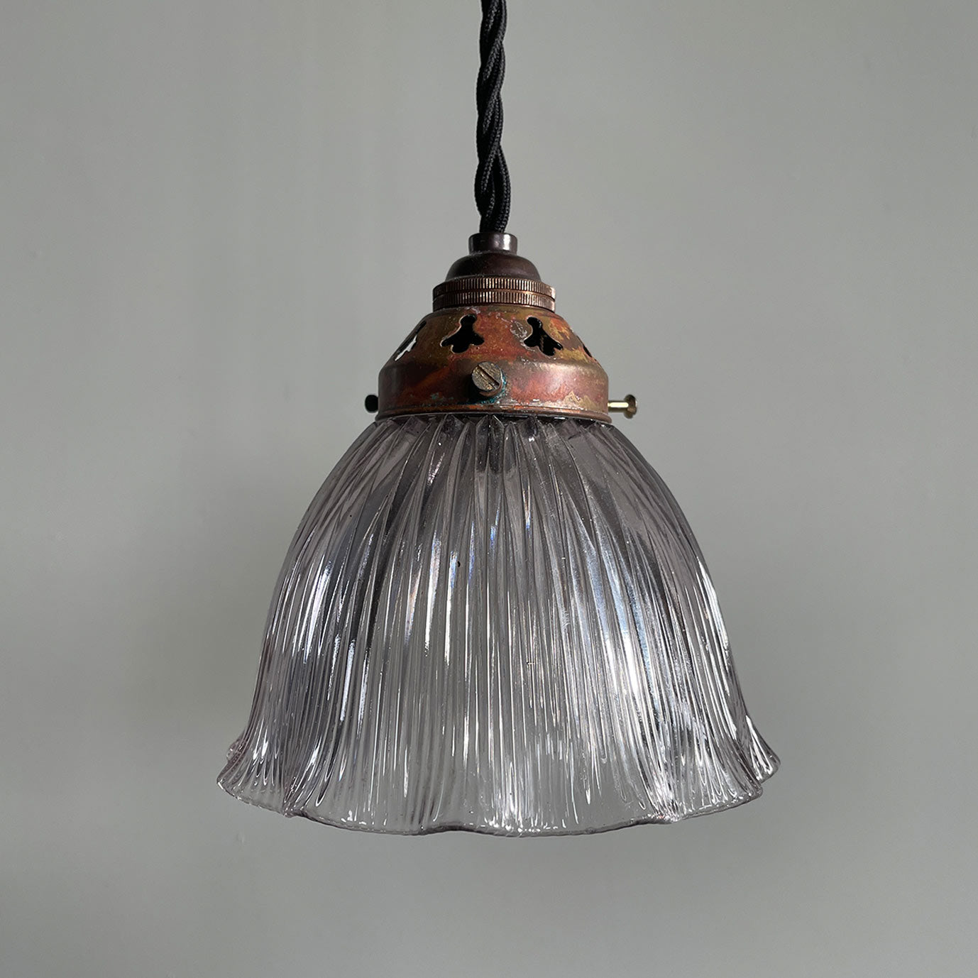 A nicely shaped Holophane Prismatic Glass flared Pendent. It has new braided black flex and new brass bayonet fitting inside. The gallery is in brass and has a fantastic patina to its surface - SHOP NOW - www.intovintage.co.uk