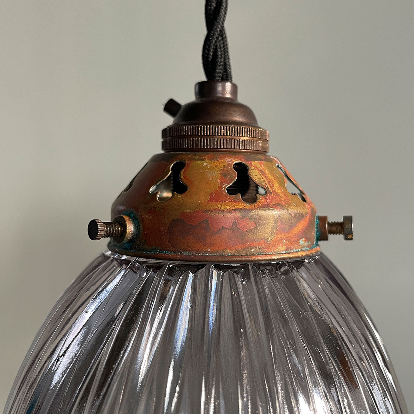 A nicely shaped Holophane Prismatic Glass flared Pendent. It has new braided black flex and new brass bayonet fitting inside. The gallery is in brass and has a fantastic patina to its surface - SHOP NOW - www.intovintage.co.uk