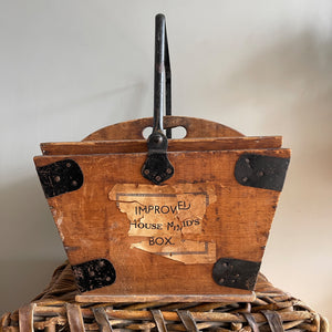 A Period House Maid's Pine Trug with sturdy metal handle and strapping. It has a removable top tray containing 4 compartments and still has the original 'IMPROVED HOUSE MAID'S BOX' label to the front. Good strong sturdy construction - SHOP NOW - www.intovintage.co.uk