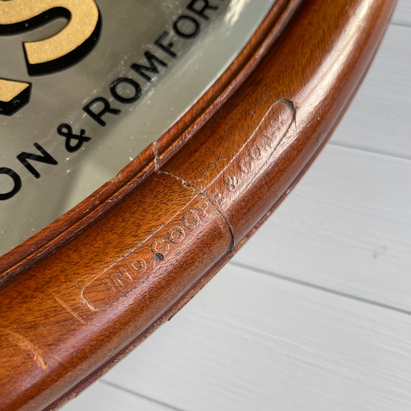 An Original Ind Coope's Pub Mirror with great foxing around the central red church. It has a rounded mahogany frame with the 'Ind Coope & Co Ltd' stamp in. A fine example of brewery advertising - SHOP NOW - www.intovintage.co.uk
