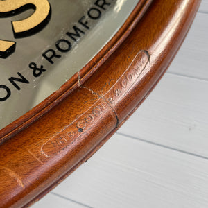 An Original Ind Coope's Pub Mirror with great foxing around the central red church. It has a rounded mahogany frame with the 'Ind Coope & Co Ltd' stamp in. A fine example of brewery advertising - SHOP NOW - www.intovintage.co.uk