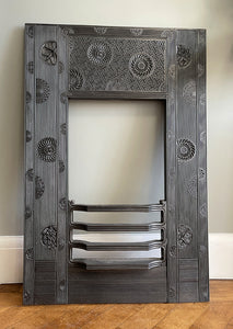 A beautiful Arts & Crafts Cast Iron Fireplace Insert, circa 1873, by the renowned Aesthetic Architect Thomas Jeckyll. The design sees finely cast rosettes of butterflies, bees and stylised floral designs on top of a reeded background. Designed for Barnard, Bishop & Barnards foundry of Norwich - SHOP NOW - www.intovintage.co.uk