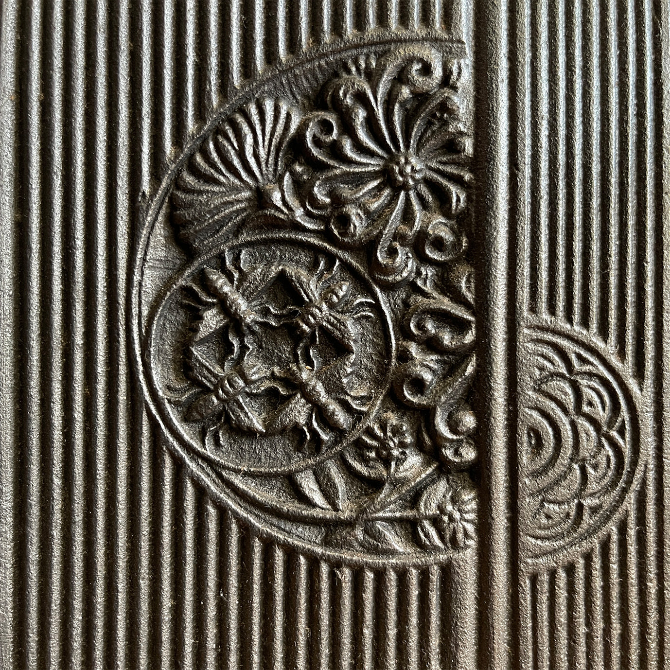 An Arts & Crafts Cast Iron Fireplace Insert, circa 1873, by the renowned Aesthetic Architect Thomas Jeckyll. The design sees finely cast rosettes of butterflies, bees and stylised floral designs on top of a reeded background. Designed for Barnard, Bishop & Barnards foundry of Norwich - SHOP NOW - www.intovintage.co.uk