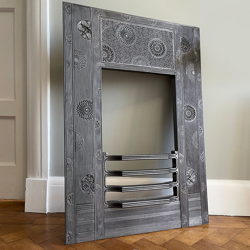A beautiful Arts & Crafts Cast Iron Fireplace Insert, circa 1873, by the renowned Aesthetic Architect Thomas Jeckyll. The design sees finely cast rosettes of butterflies, bees and stylised floral designs on top of a reeded background. Designed for Barnard, Bishop & Barnards foundry of Norwich - SHOP NOW - www.intovintage.co.uk
