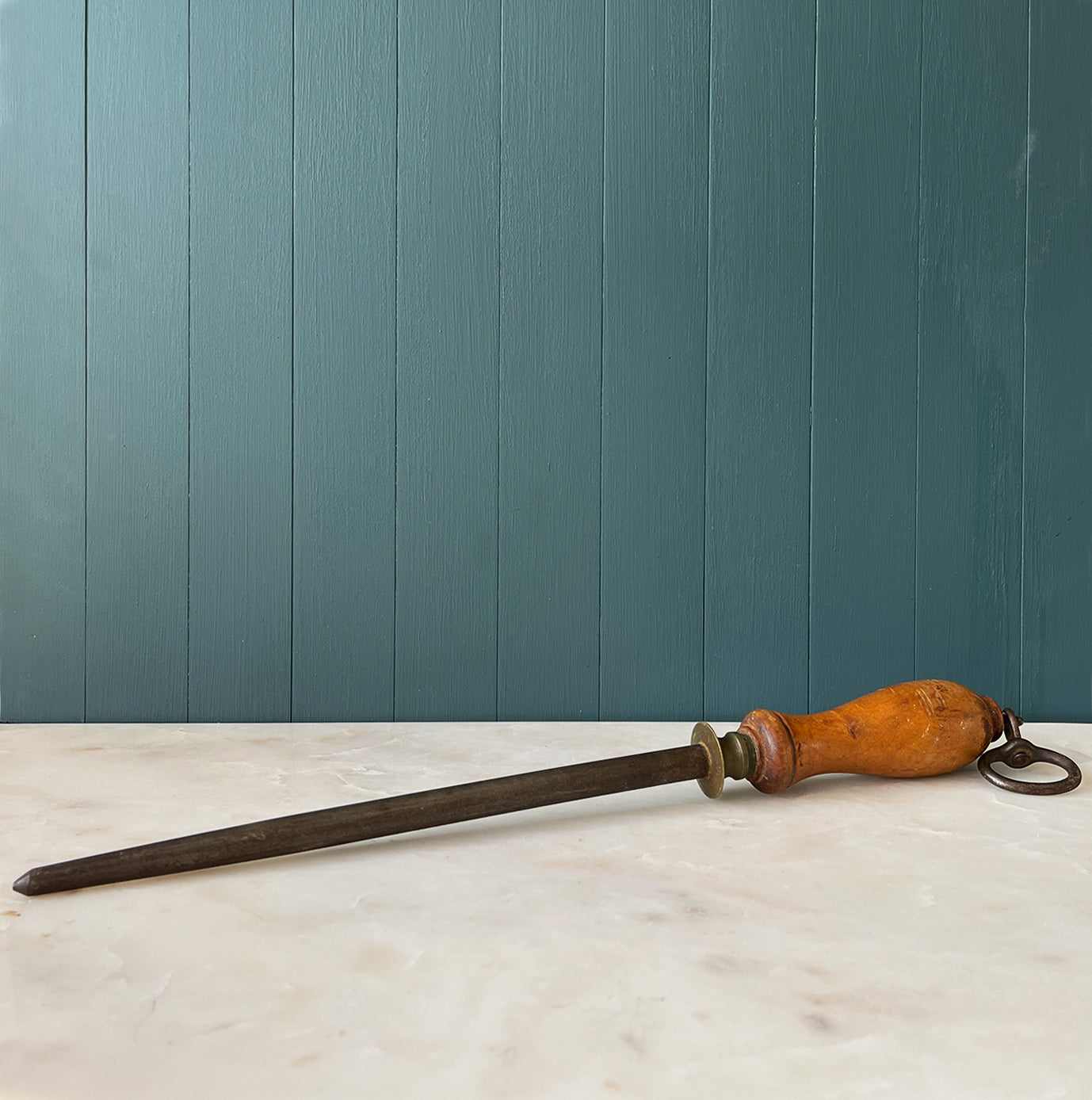 A Victorian English Steel Knife Sharpener with brass shank and sturdy steel hanging hook. Ideal for the period kitchen and keeping your cutlery nice and sharp - SHOP NOW - www.intovintage.co.uk