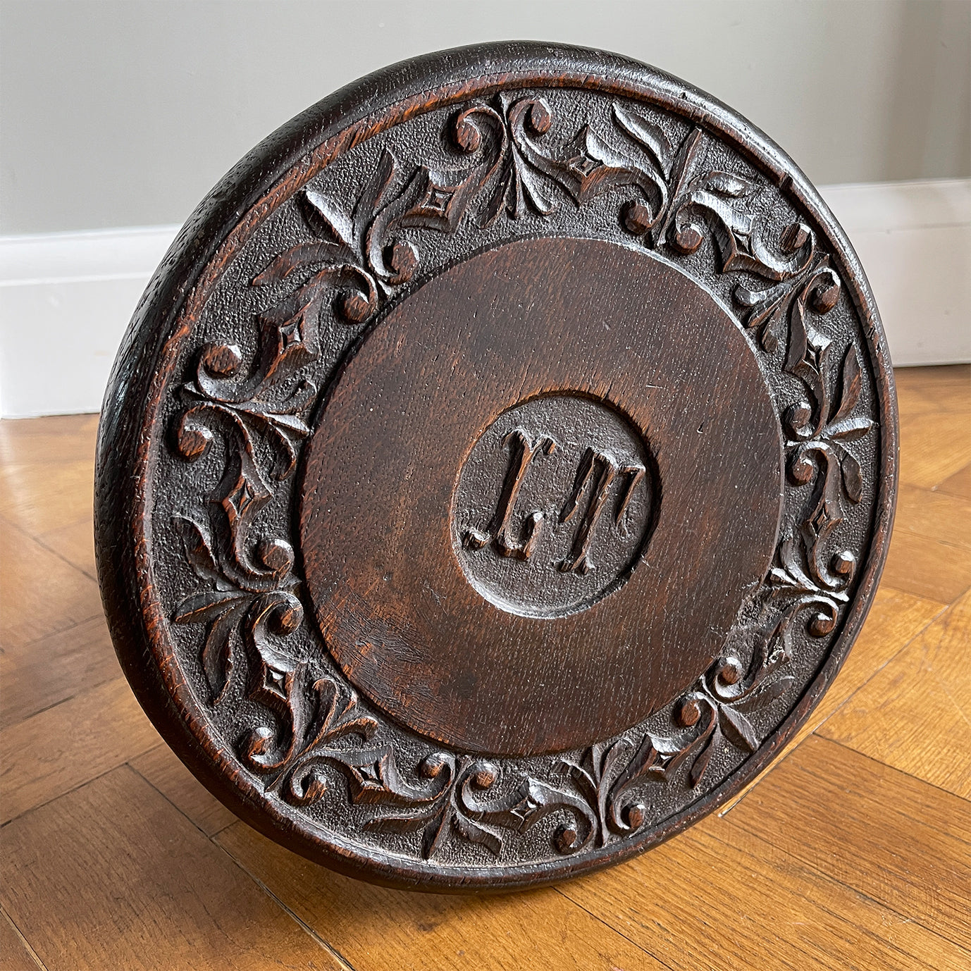 A well Carved Early Victorian Oak Stool with fantastic detail to the top seat, and the initials 'IT' carved in the centre. It has three turned legs and a rounded profile to the seats edge. Nice and stable too. - SHOP NOW - www.intovintage.co.uk
