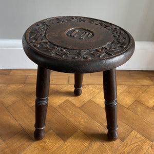 A well Carved Early Victorian Oak Stool with fantastic detail to the top seat, and the initials 'IT' carved in the centre. It has three turned legs and a rounded profile to the seats edge. Nice and stable too. - SHOP NOW - www.intovintage.co.uk