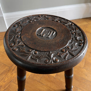 A well Carved Early Victorian Oak Stool with fantastic detail to the top seat, and the initials 'IT' carved in the centre. It has three turned legs and a rounded profile to the seats edge. Nice and stable too. - SHOP NOW - www.intovintage.co.uk