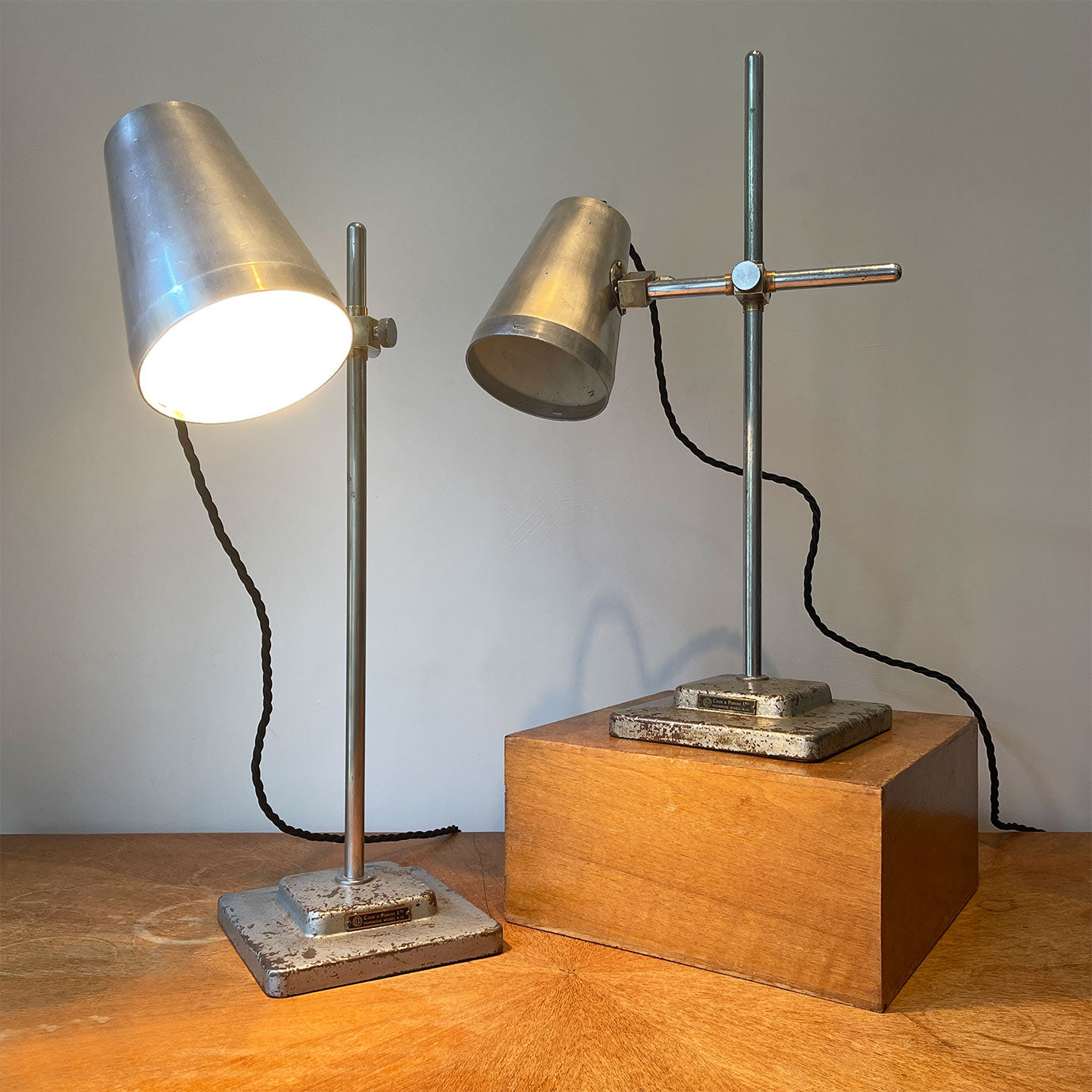 A Pair of Vintage Cook & Perkins Lab Lamps. Each Lamp has a Cook & Perkins plaque on its base - SHOP NOW - www.intovintage.co.uk