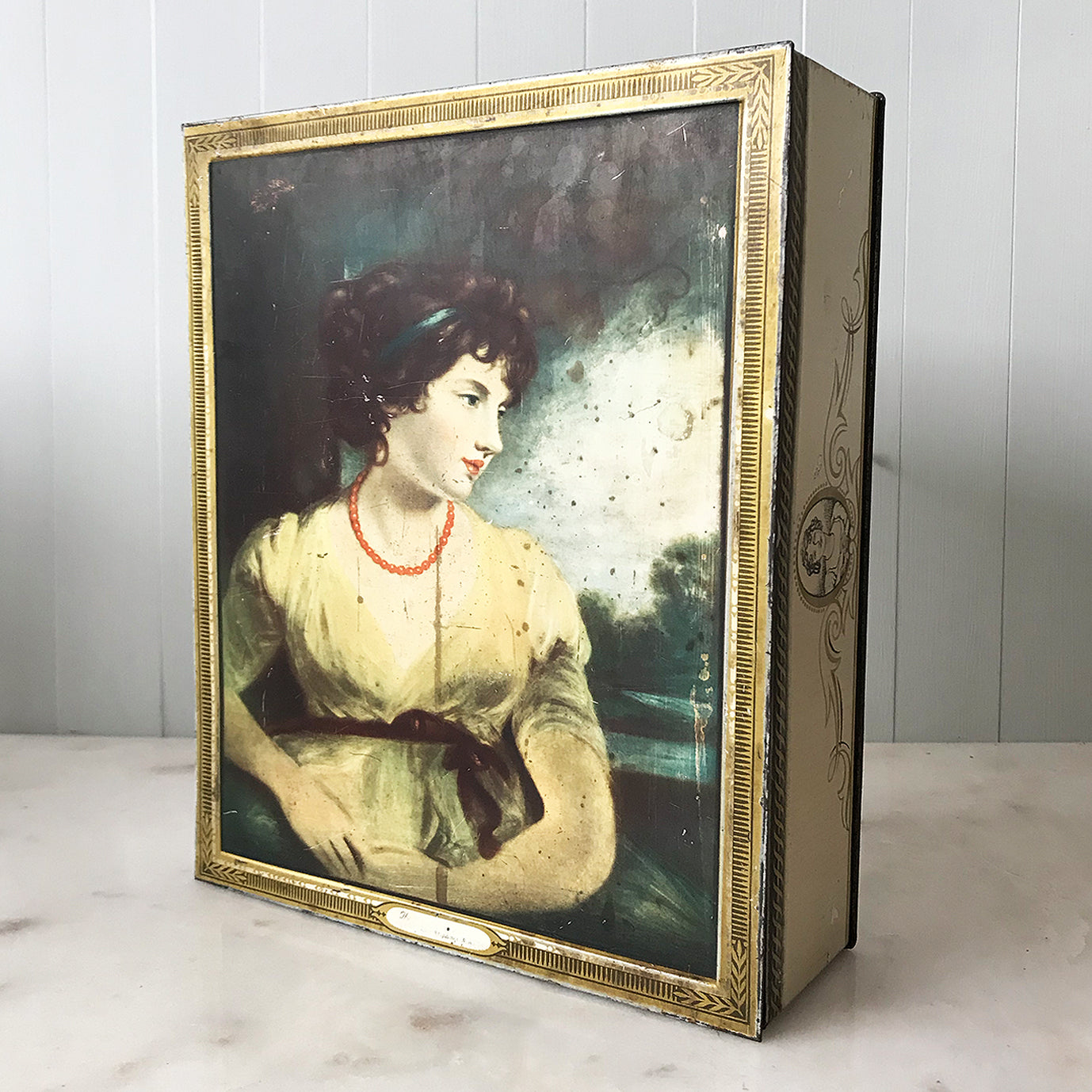 Vintage 1950s Peak Frean & Co Biscuit Tin with the Countess of Oxford after John Hoppner on the front. It has fab little line illustrations of the lady on the sides with classical gold framing and embellishments - SHOP NOW - www.intovintage.co.uk