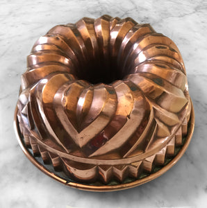 A Fine Victorian Copper Jelly or Blancmange Mould, the largest example we have seen, measuring 12 inches diameter. The Copper has a wonderful geometric pattern with a beautiful aged patina - SHOP NOW - www.intovintage.co.uk