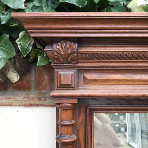 A tall imposing French oak mirror&nbsp;with a lovely warm colour and good amount of foxing to the original mirror plate. Would make a stunning statement on any wall or propped up against a wall - SHOP NOW - www.intovintage.co.uk