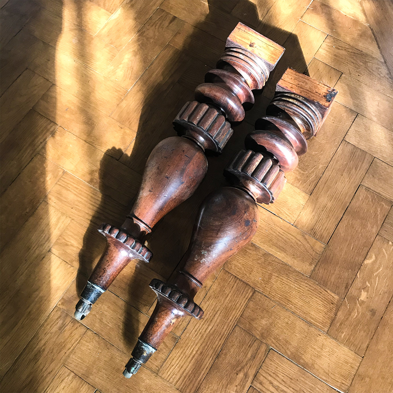 Beautifully turned and fantastically detailed. Two substantial antique furniture legs in Rosewood finished in an original brass caster. for an interior project - SHOP NOW - www.intovintage.co.uk