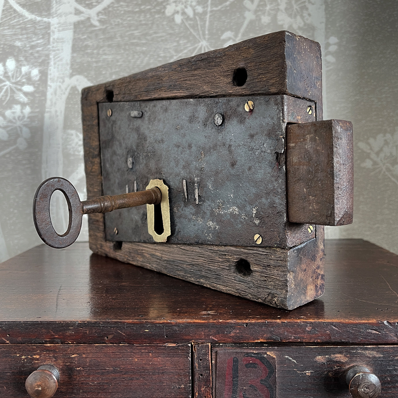 A working Georgian mahogany encased steel door lock with original key. Brass escutcheon to the open face side. The mahogany case has a partly worn makers mark stamped in - SHOP NOW - www.intovintage.co.uk