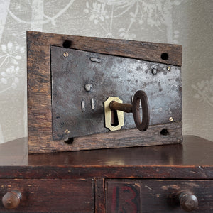 A working Georgian mahogany encased steel door lock with original key. Brass escutcheon to the open face side. The mahogany case has a partly worn makers mark stamped in - SHOP NOW - www.intovintage.co.uk