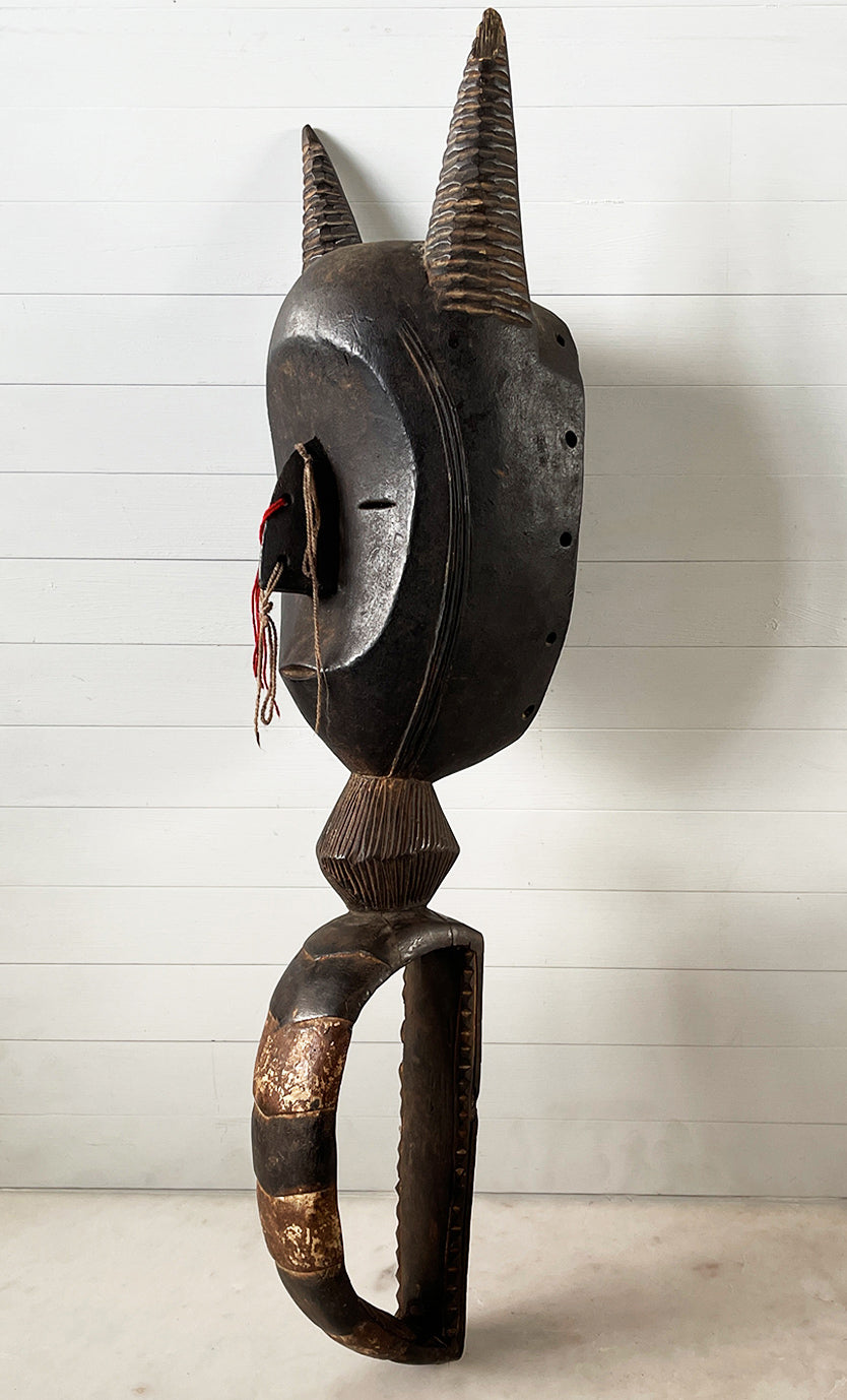 A magnificent Antique African Mask complete with handle so that the tribesman could raise it up to the face - SHOP NOW - www.intovintage.co.uk