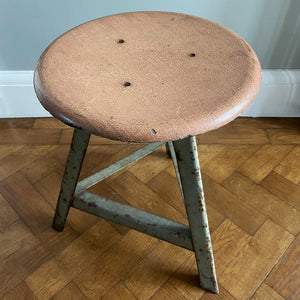 Good looking Vintage Metal and Wood Painted Stool. Great age related wear, patina and totally solid. The light green paint has worn and chipped away giving the stool that bang on look. The wooded seat section has its original painted wood graining paint and shows signs of years of workshop use and ware. A great looking stool that would compliment any setting. 