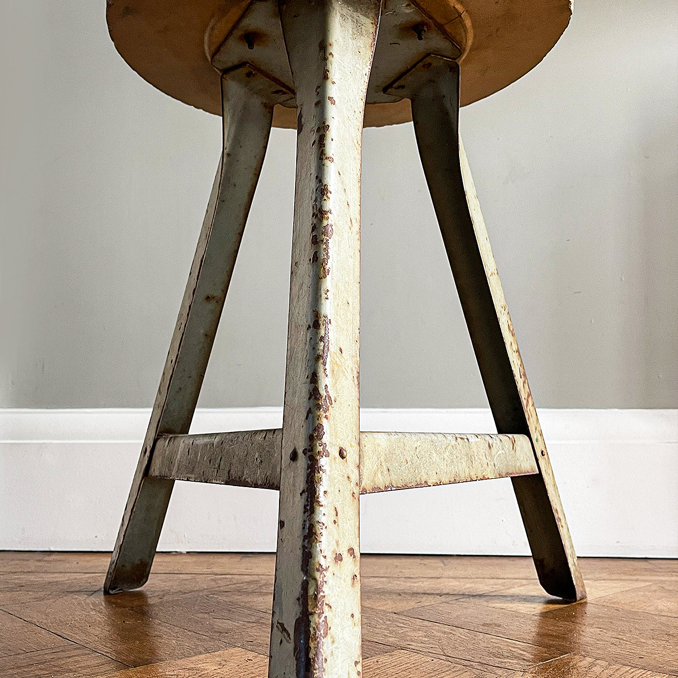 Good looking Vintage Metal and Wood Painted Stool. Great age related wear, patina and totally solid. The light green paint has worn and chipped away giving the stool that bang on look. The wooded seat section has its original painted wood graining paint and shows signs of years of workshop use and ware. A great looking stool that would compliment any setting. 
