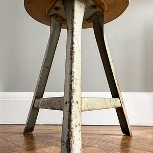 Good looking Vintage Metal and Wood Painted Stool. Great age related wear, patina and totally solid. The light green paint has worn and chipped away giving the stool that bang on look. The wooded seat section has its original painted wood graining paint and shows signs of years of workshop use and ware. A great looking stool that would compliment any setting. 