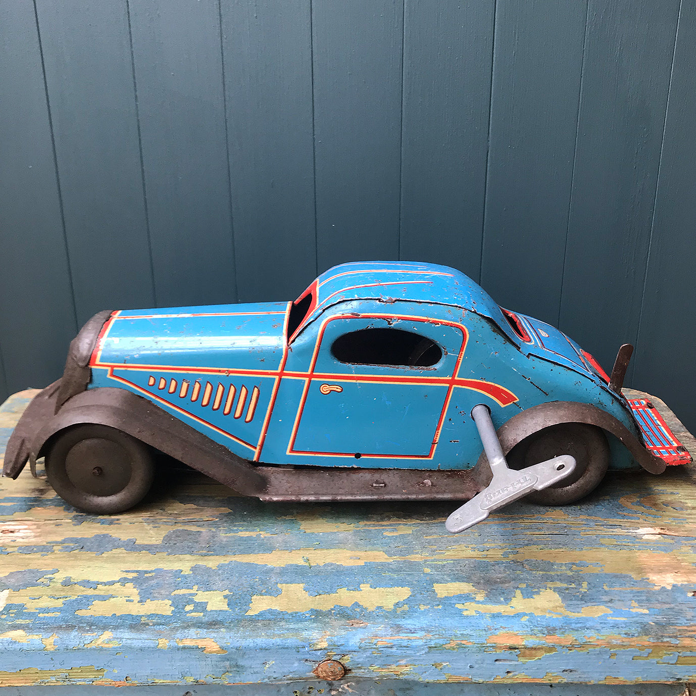 Rare large pre-war 1935 Marx clockwork tinplate LMC 217 Mechanical Coupé in the rare blue pinstripe finish. Marked 'Made in England' on the boot and still having its back running step. This model was made in the Marx Dudley factory - SHOP NOW - www.intovintage.co.uk