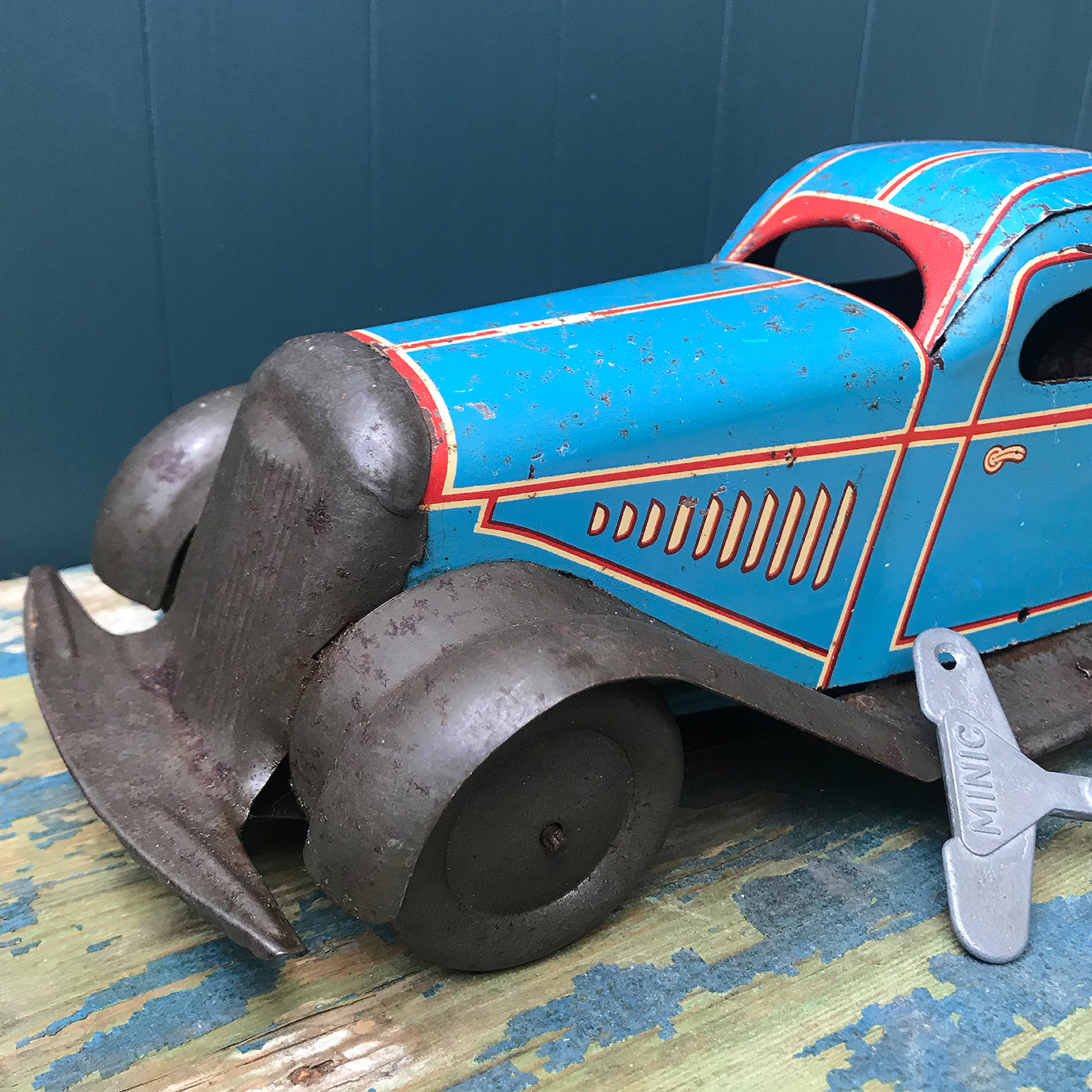 Rare large pre-war 1935 Marx clockwork tinplate LMC 217 Mechanical Coupé in the rare blue pinstripe finish. Marked 'Made in England' on the boot and still having its back running step. This model was made in the Marx Dudley factory - SHOP NOW - www.intovintage.co.uk