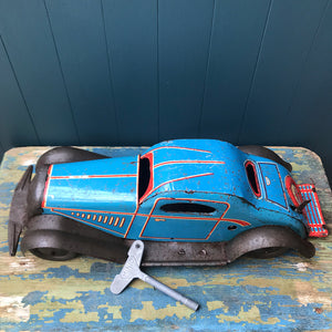 Rare large pre-war 1935 Marx clockwork tinplate LMC 217 Mechanical Coupé in the rare blue pinstripe finish. Marked 'Made in England' on the boot and still having its back running step. This model was made in the Marx Dudley factory - SHOP NOW - www.intovintage.co.uk