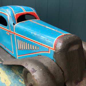 Rare large pre-war 1935 Marx clockwork tinplate LMC 217 Mechanical Coupé in the rare blue pinstripe finish. Marked 'Made in England' on the boot and still having its back running step. This model was made in the Marx Dudley factory - SHOP NOW - www.intovintage.co.uk