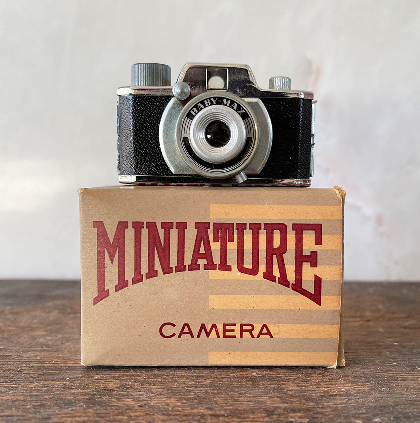 A rare Tougodo Baby Max Miniature 17.5mm Camera in its original box with instruction sheet. The Baby Max is a Japanese sub-miniature camera that takes ten 14x14mm images on 17.5mm paper backed roll film - SHOP NOW - www.intovintage.co.uk