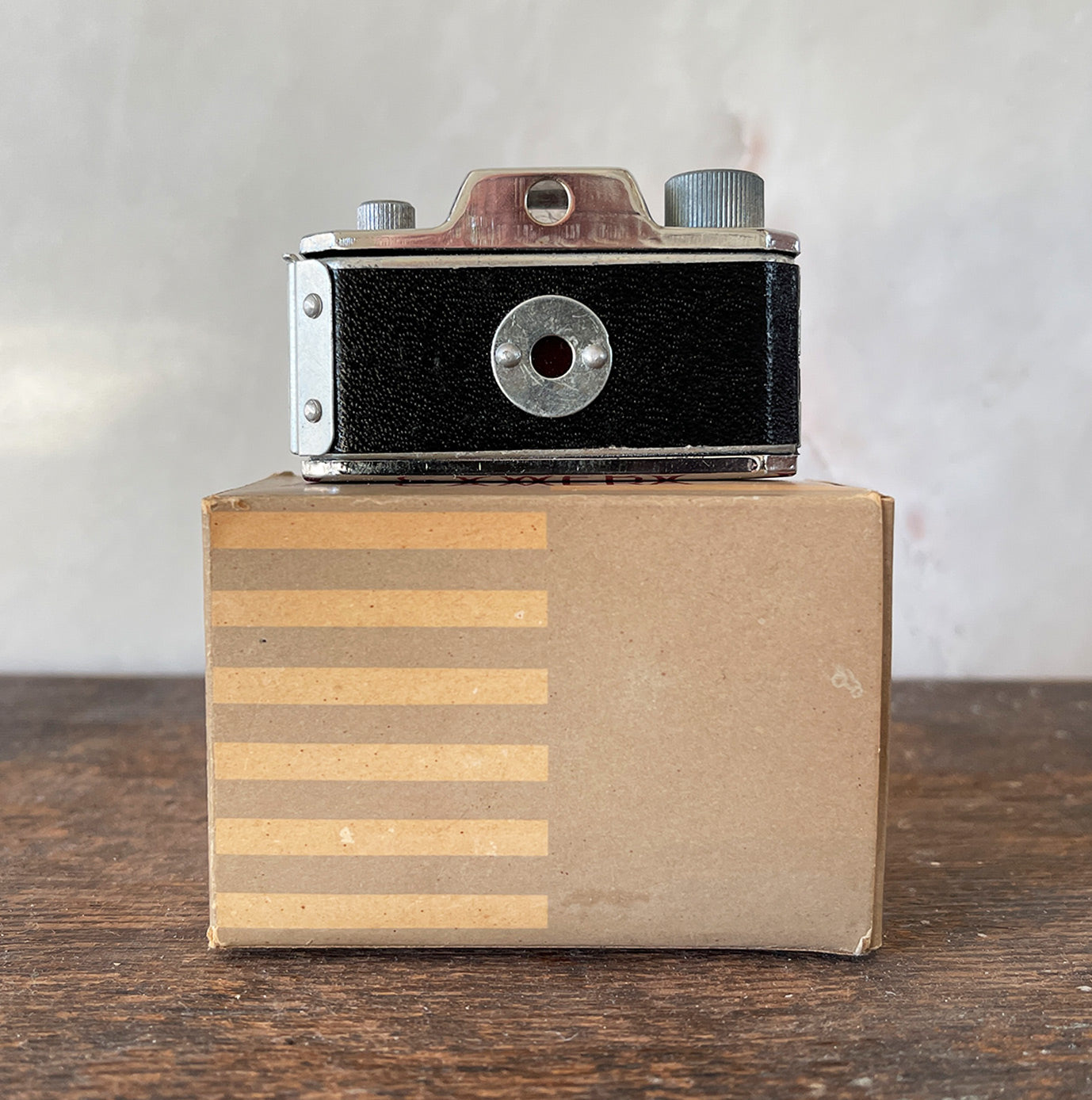 A rare Tougodo Baby Max Miniature 17.5mm Camera in its original box with instruction sheet. The Baby Max is a Japanese sub-miniature camera that takes ten 14x14mm images on 17.5mm paper backed roll film - SHOP NOW - www.intovintage.co.uk