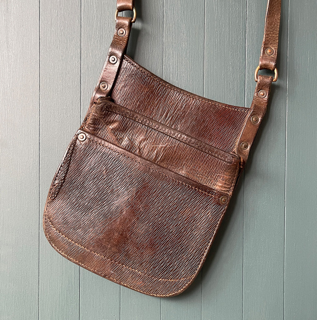 Vintage Bus Conductors Leather Money Bag made from quality thick leather with studded copper rivets and brass buckles. Stamped 'A3969' on the reverse. It has two good sized pockets perfect for your cash and loose change - SHOP NOW - www.intovintage.co.uk
