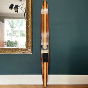 Uber cool vintage wooden mono water ski. It has a wonderful warm tone to the two tone wood. We have removed the old rubber footholds and given it a polish so that it can be seen in its full glory when mounted on the wall - SHOP NOW - www.intovintage.co.uk