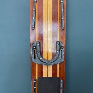 Uber cool vintage wooden mono water ski. It has a wonderful warm tone to the two tone wood. We have removed the old rubber footholds and given it a polish so that it can be seen in its full glory when mounted on the wall - SHOP NOW - www.intovintage.co.uk