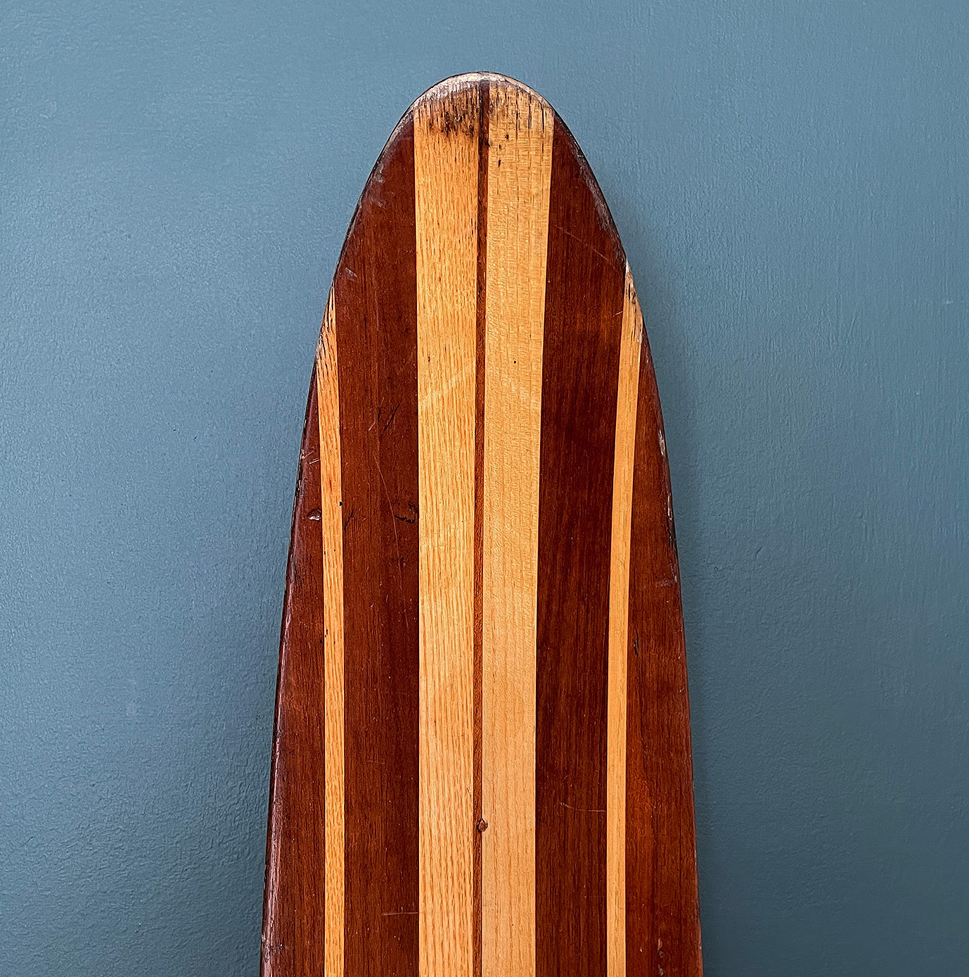 Uber cool vintage wooden mono water ski. It has a wonderful warm tone to the two tone wood. We have removed the old rubber footholds and given it a polish so that it can be seen in its full glory when mounted on the wall - SHOP NOW - www.intovintage.co.uk