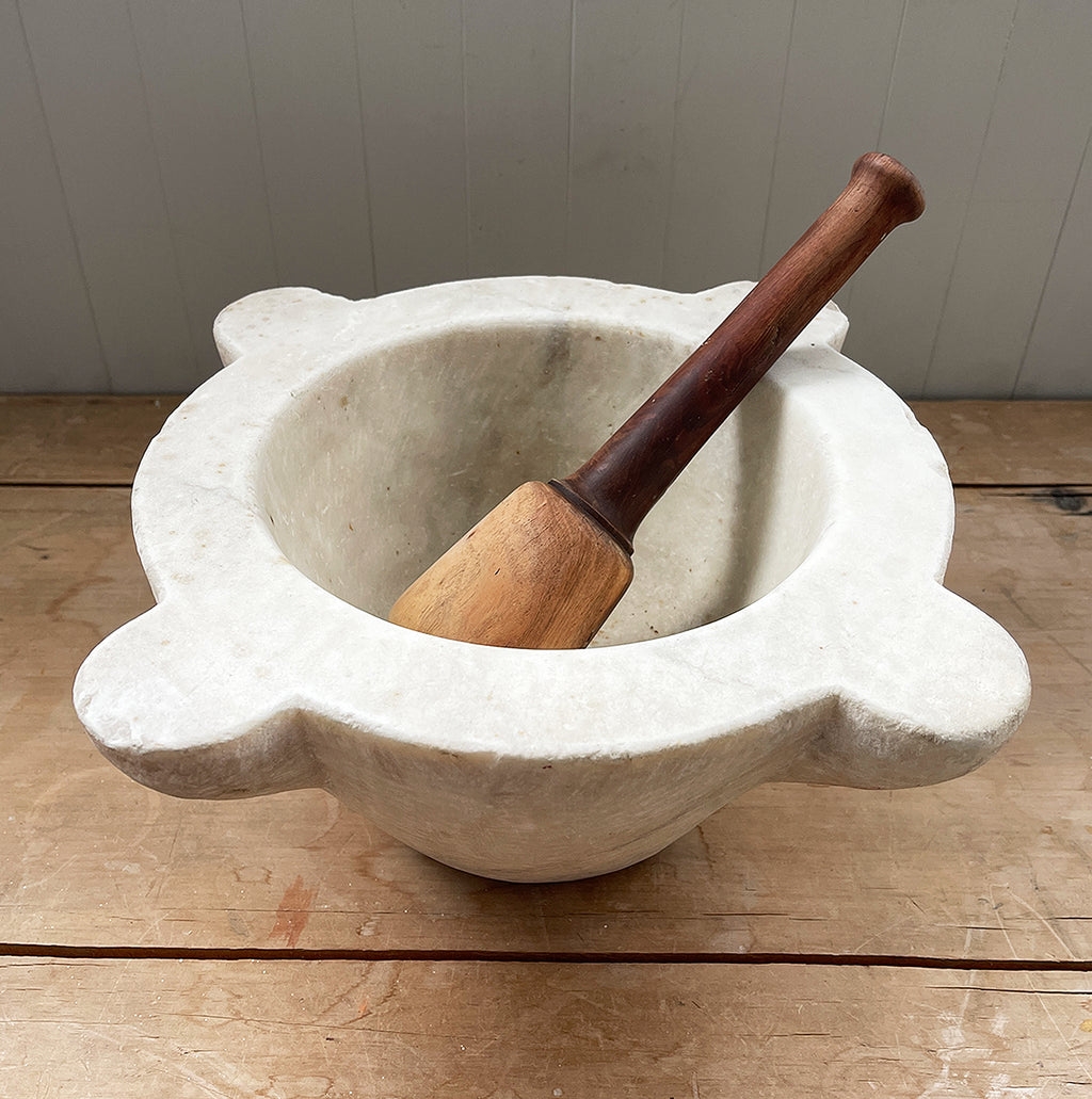 A large, time worn Mortice & Pestle in a creamy white marble. The wooden pestle has a weighted end. A beautiful piece for the kitchen - SOP NOW - www.intovintage.co.uk
