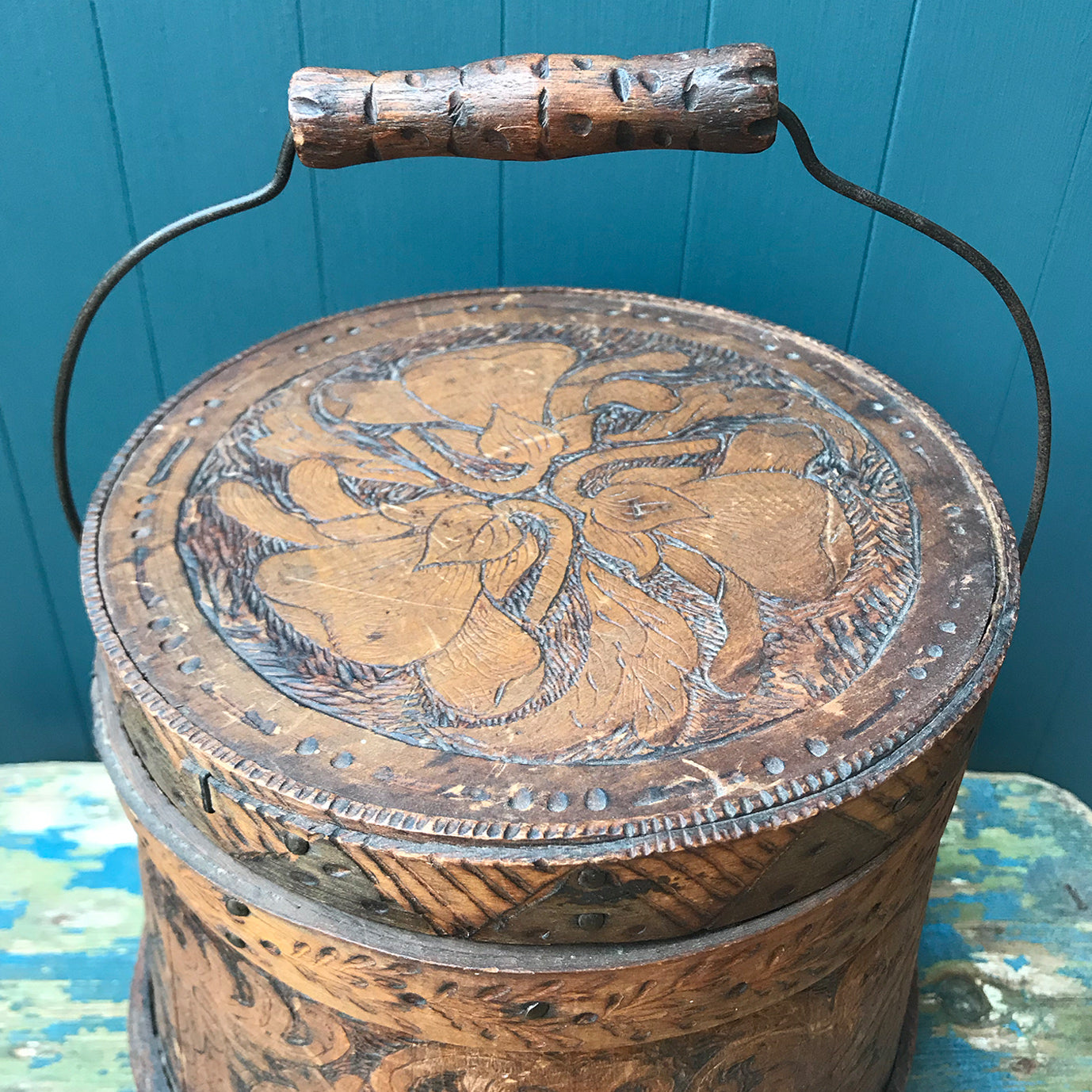 A beautiful early Nordic, carved and hot poker-worked wooden vessel with lid and handle. hand carved with peony and lily flowers and a stylised oak leaf patten on the bindings. would make an ideal biscuit barrel! - SHOP NOW - www.intovintage.co.uk