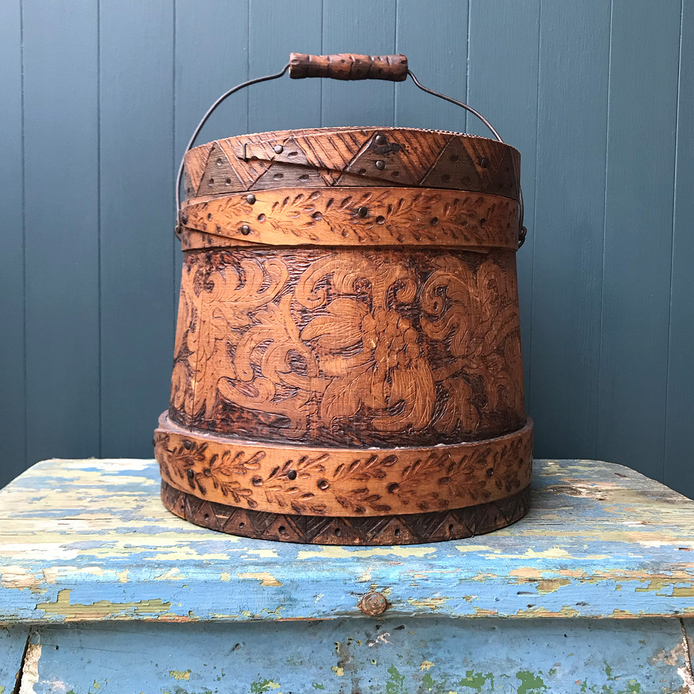A beautiful early Nordic, carved and hot poker-worked wooden vessel with lid and handle. hand carved with peony and lily flowers and a stylised oak leaf patten on the bindings. would make an ideal biscuit barrel! - SHOP NOW - www.intovintage.co.uk