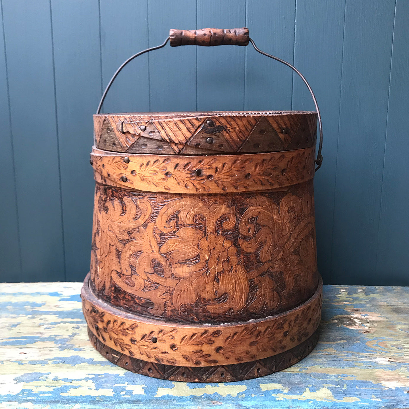 A beautiful early Nordic, carved and hot poker-worked wooden vessel with lid and handle. hand carved with peony and lily flowers and a stylised oak leaf patten on the bindings. would make an ideal biscuit barrel! - SHOP NOW - www.intovintage.co.uk