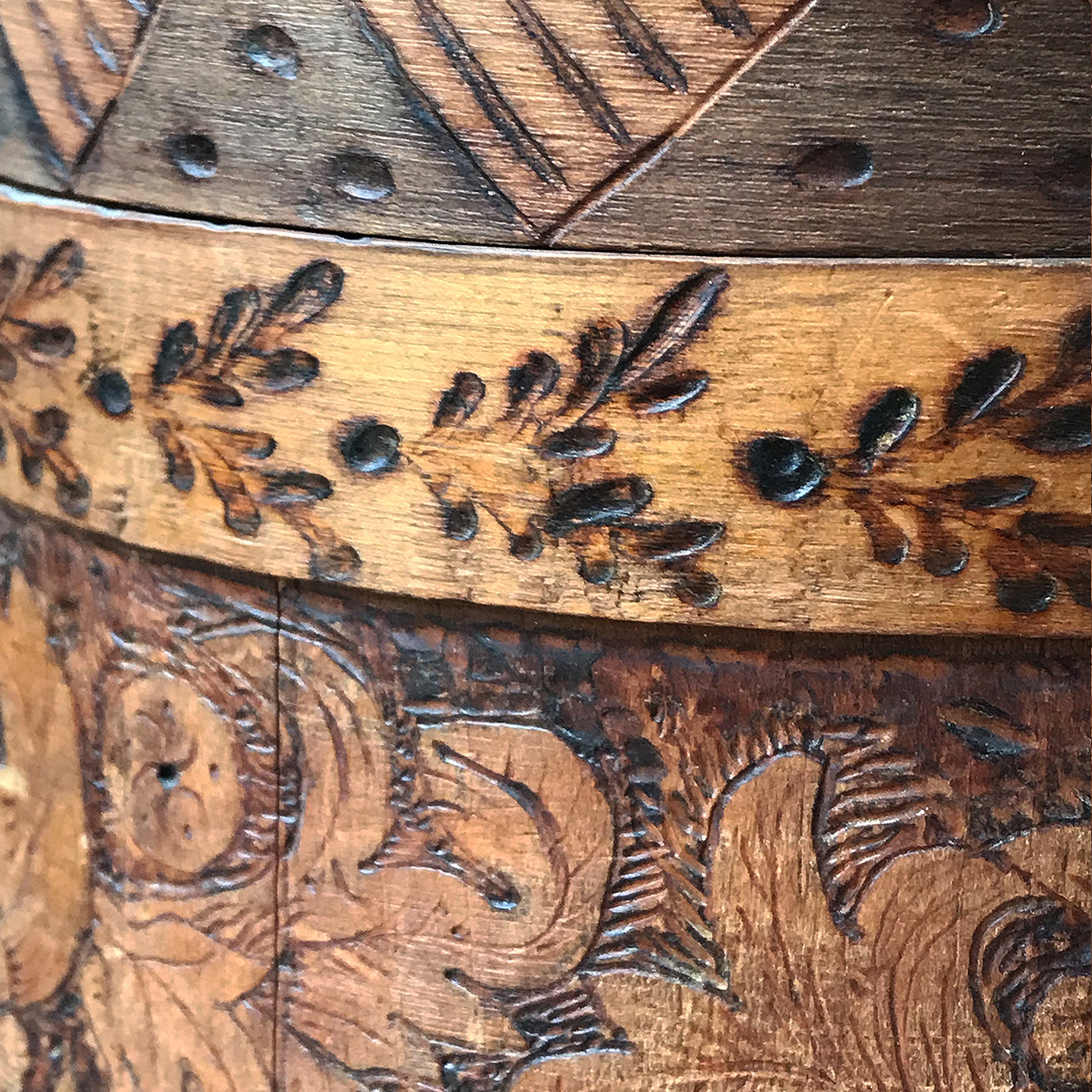 A beautiful early Nordic, carved and hot poker-worked wooden vessel with lid and handle. hand carved with peony and lily flowers and a stylised oak leaf patten on the bindings. would make an ideal biscuit barrel! - SHOP NOW - www.intovintage.co.uk